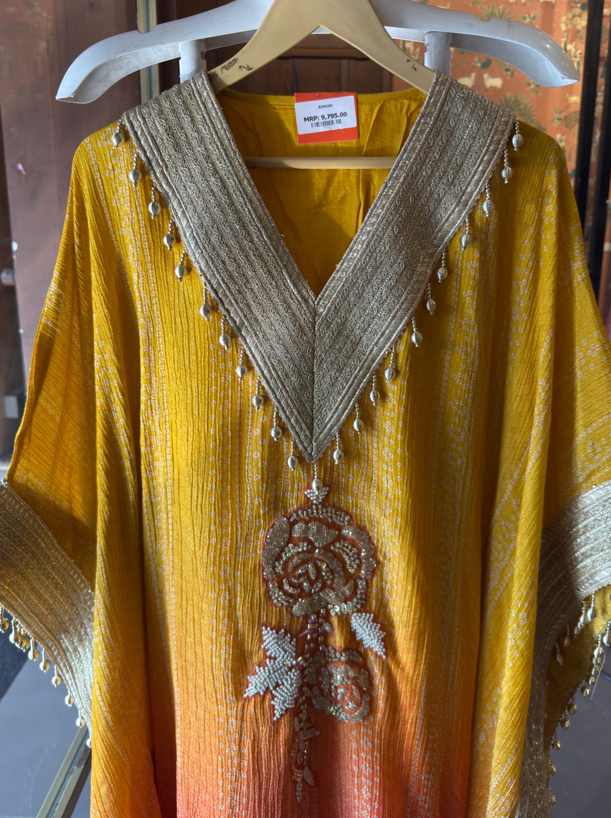 Kaftan dress featuring a vibrant ombré color